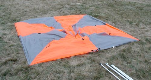 Stake corners in a perfect square and slightly stretched. This prevents a diamond staking pattern which will cause one corner to be up in the air.