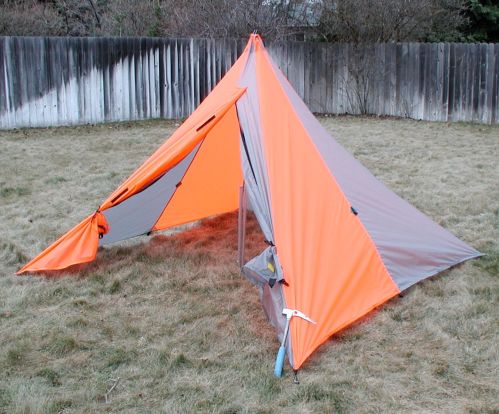 Doors can be tied back and pole inserted after the 4 corners are staked out