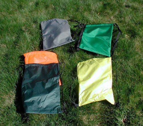 Clockwise from top left. 210d Foliage Green, 420d  grass green, 70d silnylon yellow, 30d silnylon dark forest, 30d silnylon blaze orange.
