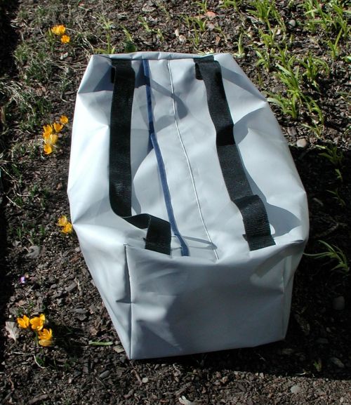 Truck tarp reinforced vinyl duffle. Handles work as shoulder straps. Number 10 zipper. 5000 cu inches.Uses as sled bag for ski patrol, drillers. conservation corp and wild land  fire fighters gear bag. Custom orders.