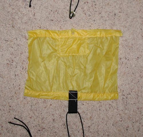 grommet in 4 layers of 30d silnylon, fabric stretched and grommet pulled out before 1" webbing stitched on failed.