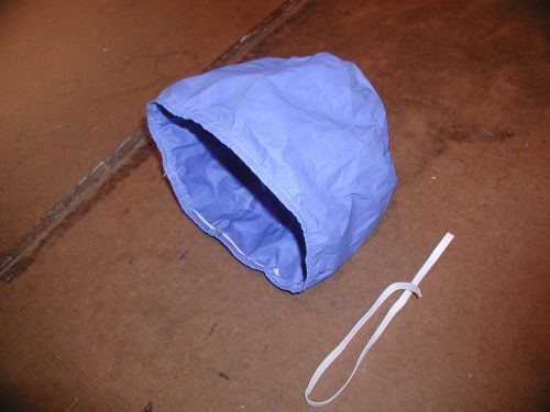 Shower cap made of 70 denier ripstop nylon with a .5 oz silicone and polyurethane blend coating. 14 years continuous use. Coating still waterproof. No fraying. The elastic needs to be replaced, the rubber wore out.